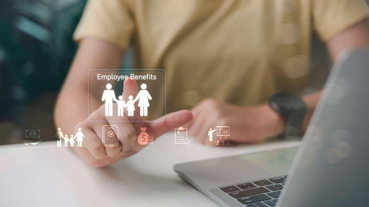 Employee benefits concept with person selecting digital icon of family