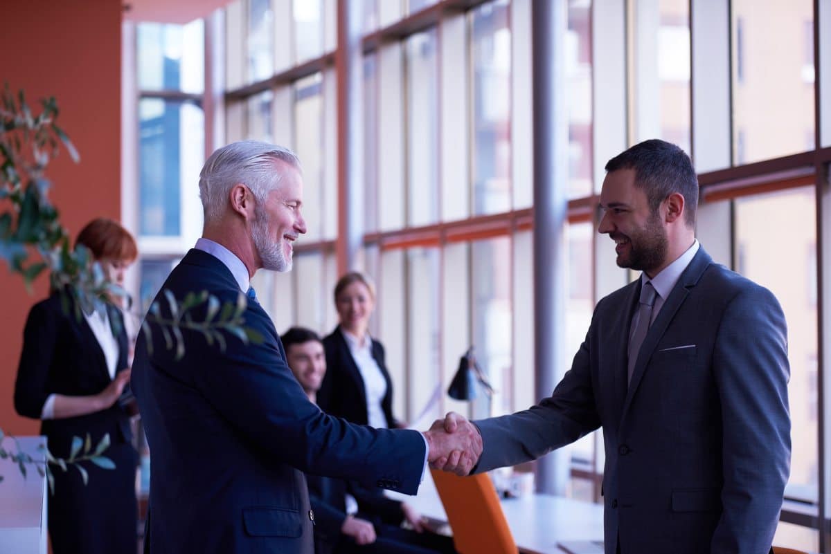 colleagues shaking hands