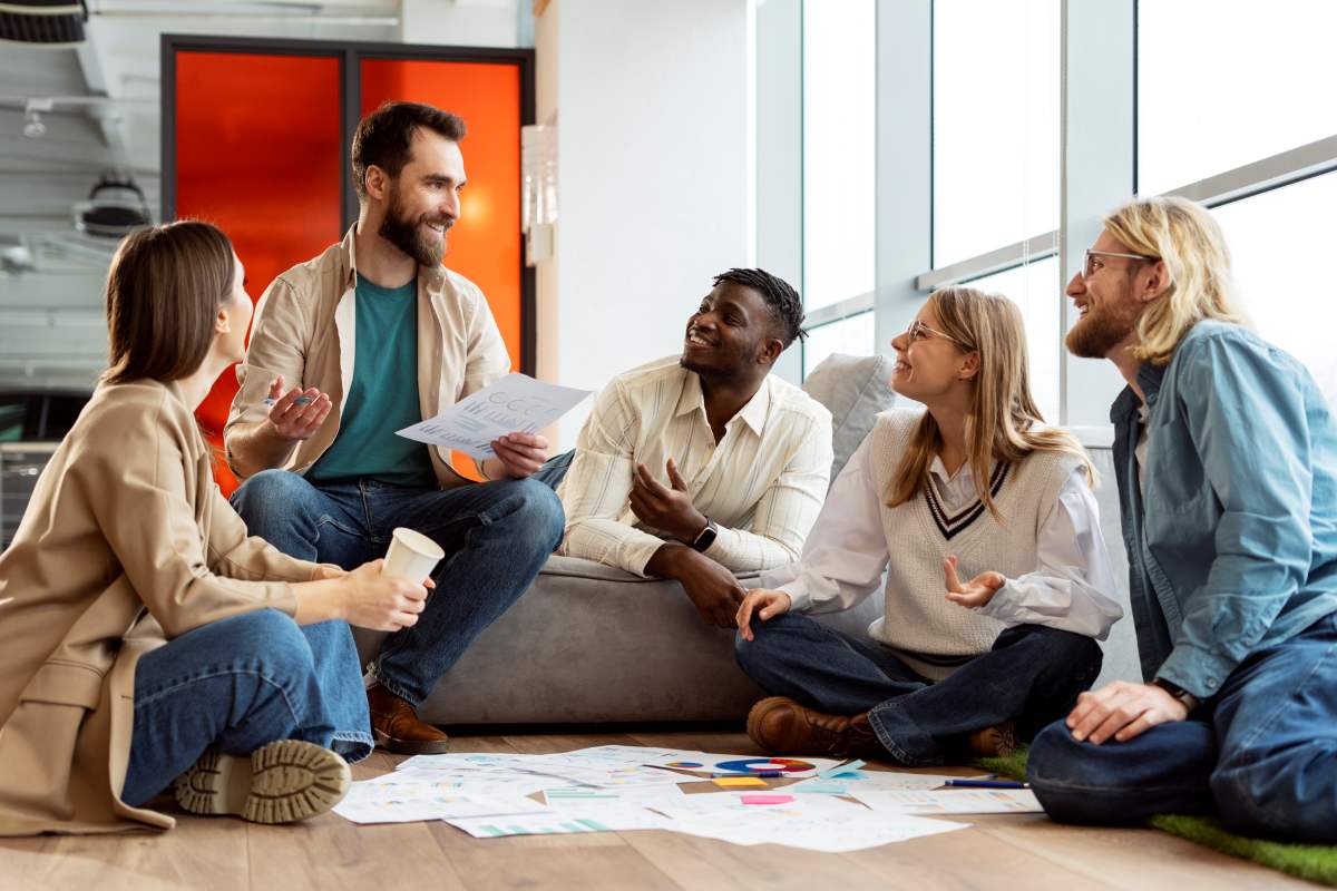 Group of young people having business meeting